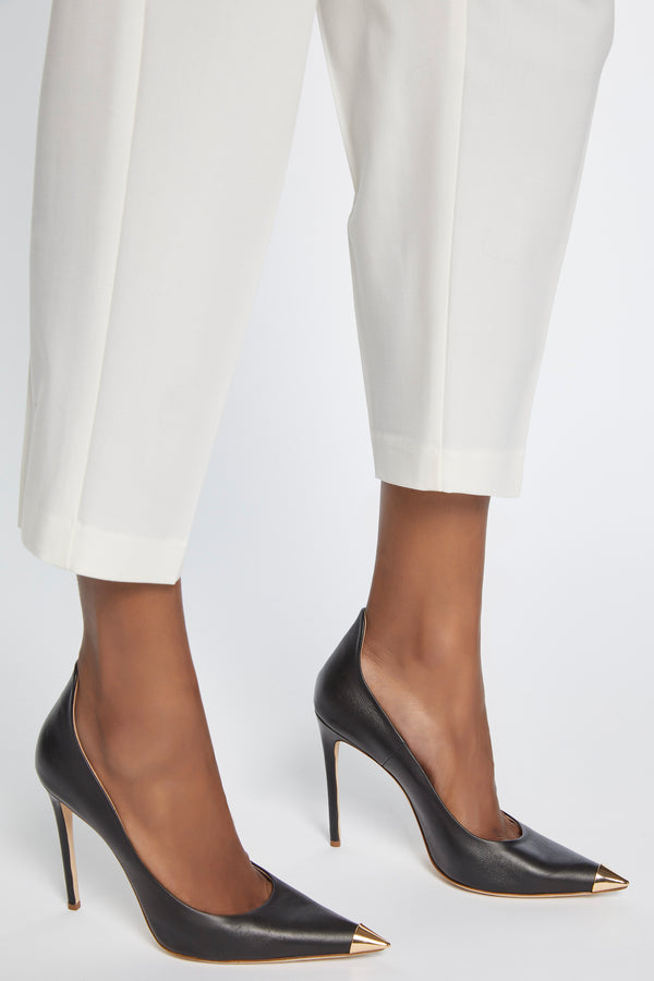 LEATHER PUMPS WITH GOLD METAL TIPS