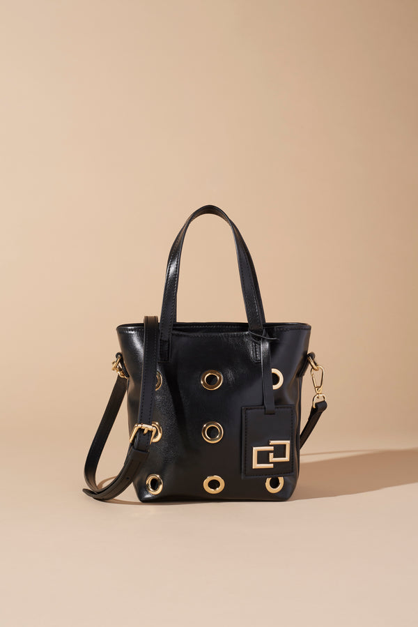 FAUX LEATHER FANCY BAG WITH METAL EYELETS