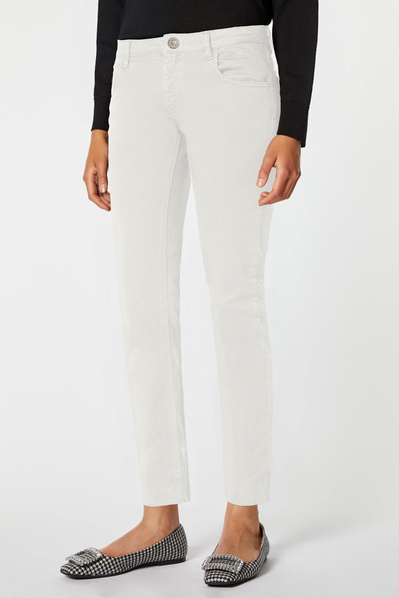 LOW-WAIST SKINNY JEANS WITH BEJEWELLED BUTTONS