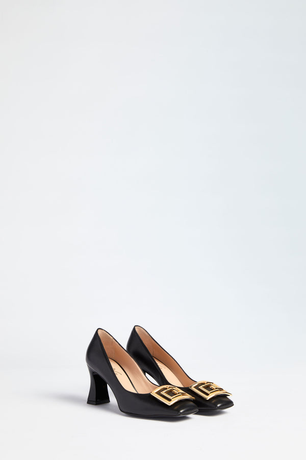 SQUARE-TOE PUMPS WITH OVERSIZED GOLD BUCKLES