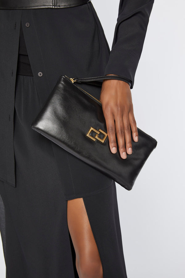 LEATHER CLUTCH BAG WITH GOLD CG LOGO AND LEATHER WRISTLET