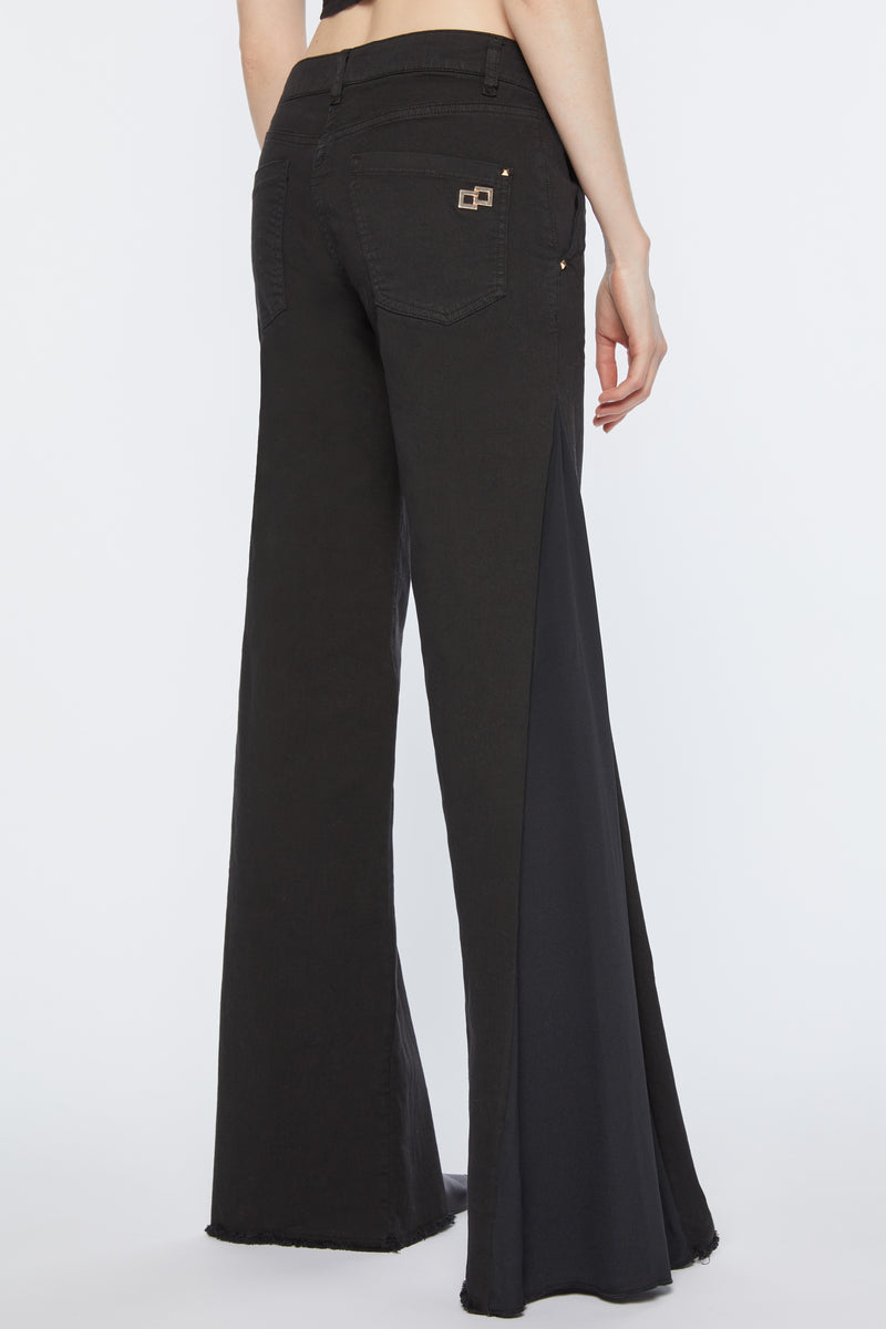 FLARED JEANS IN STRETCH COTTON GABARDINE WITH CRÊPE DE CHINE EMBELLISHMENTS ON THE SIDES 