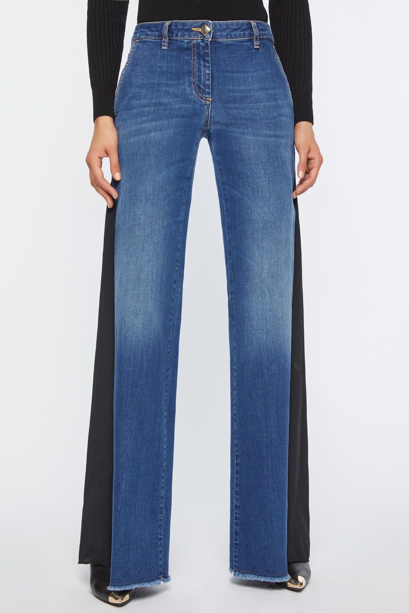 FLARED JEANS IN MEDIUM-WASH STRETCH DENIM WITH CRÊPE DE CHINE EMBELLISHMENTS ON THE SIDES