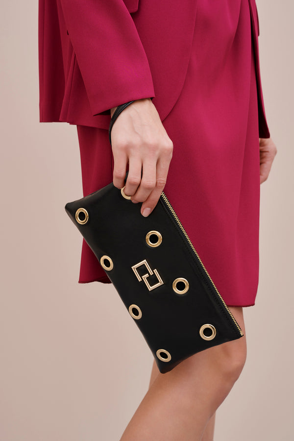 FAUX LEATHER CLUTCH WITH METAL EYELETS