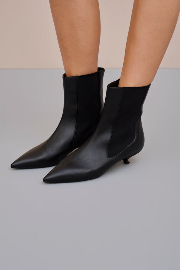 ELASTIC-SIDED LEATHER BOOTS 